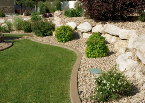 Rocks help fill in those hills that are hard to mow, providing low maintenance